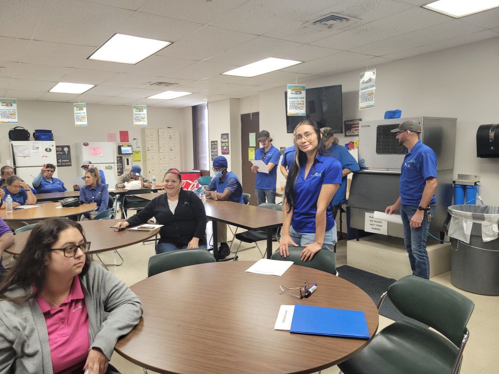 A photo of SCC associates at Texas A&M University Corpus Christi putting together a giftbag treasure hunt